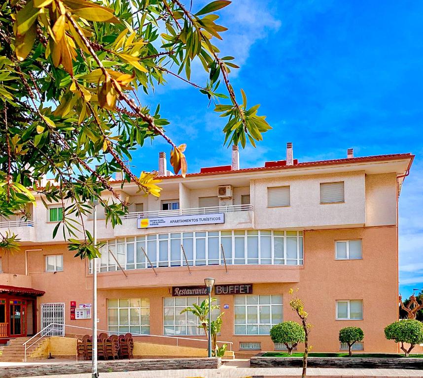 a building with a monkey on the top of it at Destino De Sol De Los Alcazares in Los Alcázares