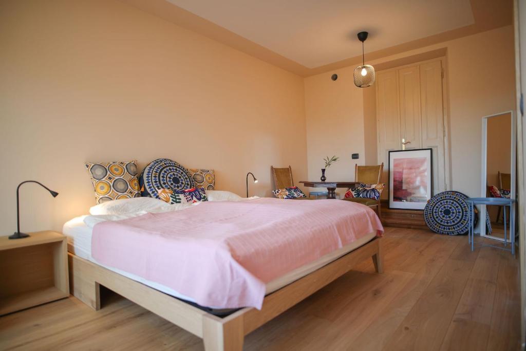 Postel nebo postele na pokoji v ubytování Casa ViniToscani