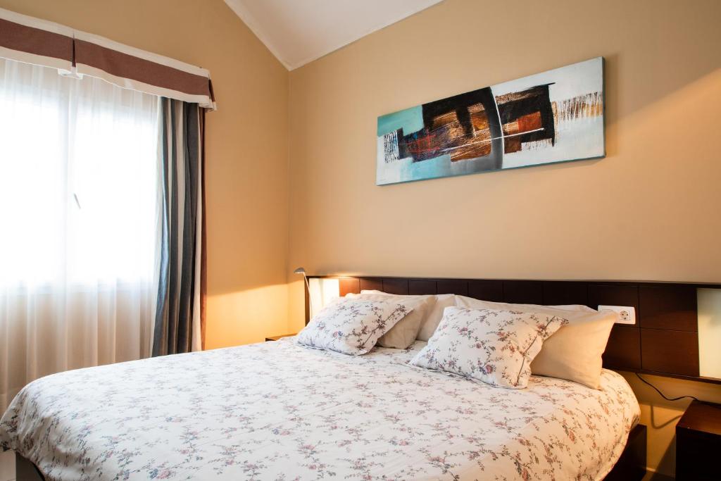 Postel nebo postele na pokoji v ubytování Casa del Capitán
