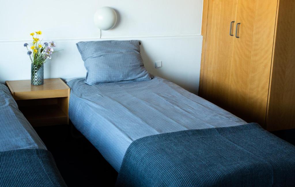 Postel nebo postele na pokoji v ubytování Hotel-B