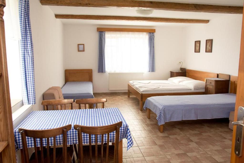 Postel nebo postele na pokoji v ubytování Penzion Baborákovi