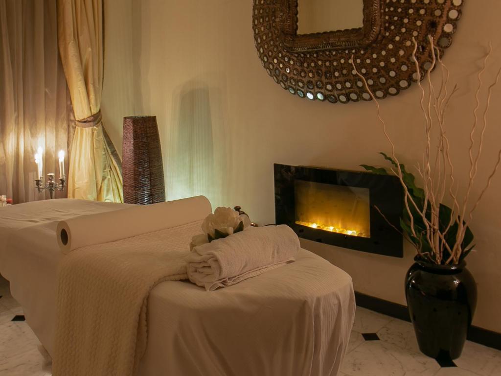 Postel nebo postele na pokoji v ubytování Hotel Jolanda