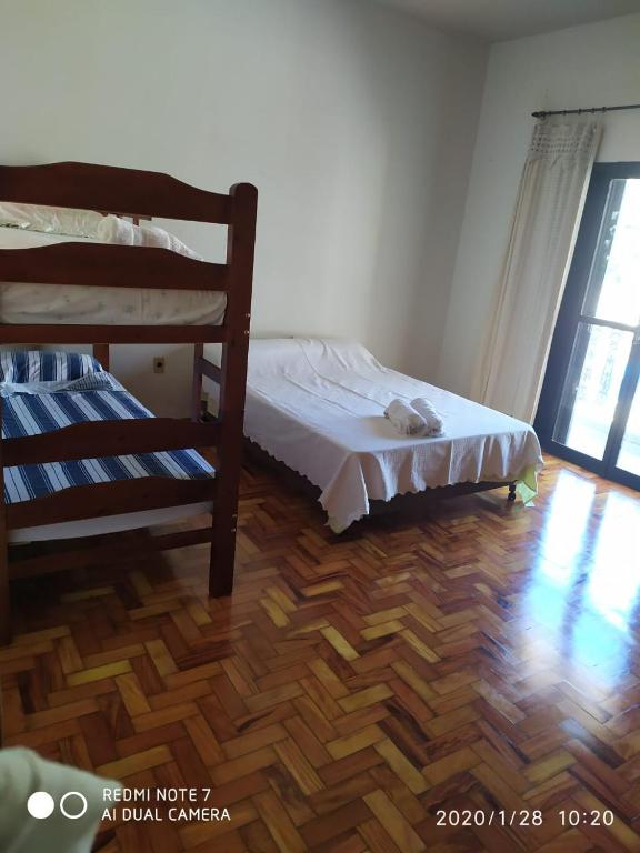 Postel nebo postele na pokoji v ubytování Hostel da Moda