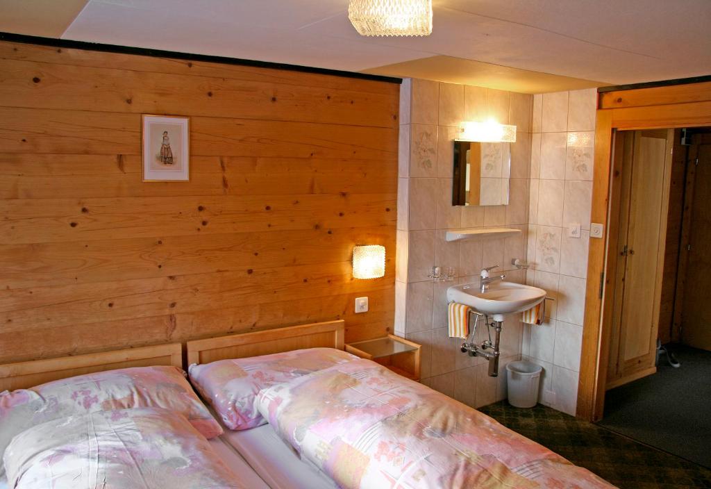 Postel nebo postele na pokoji v ubytování Anemone