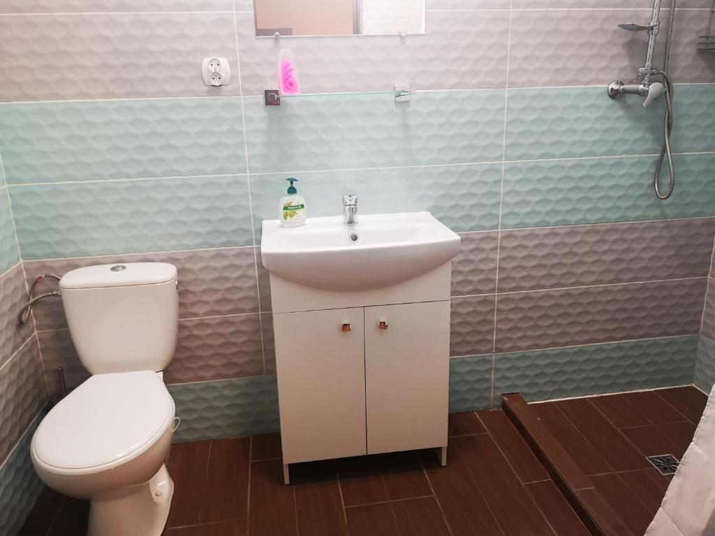 Kúpeľňa v ubytovaní Pokoje o wysokim standardzie