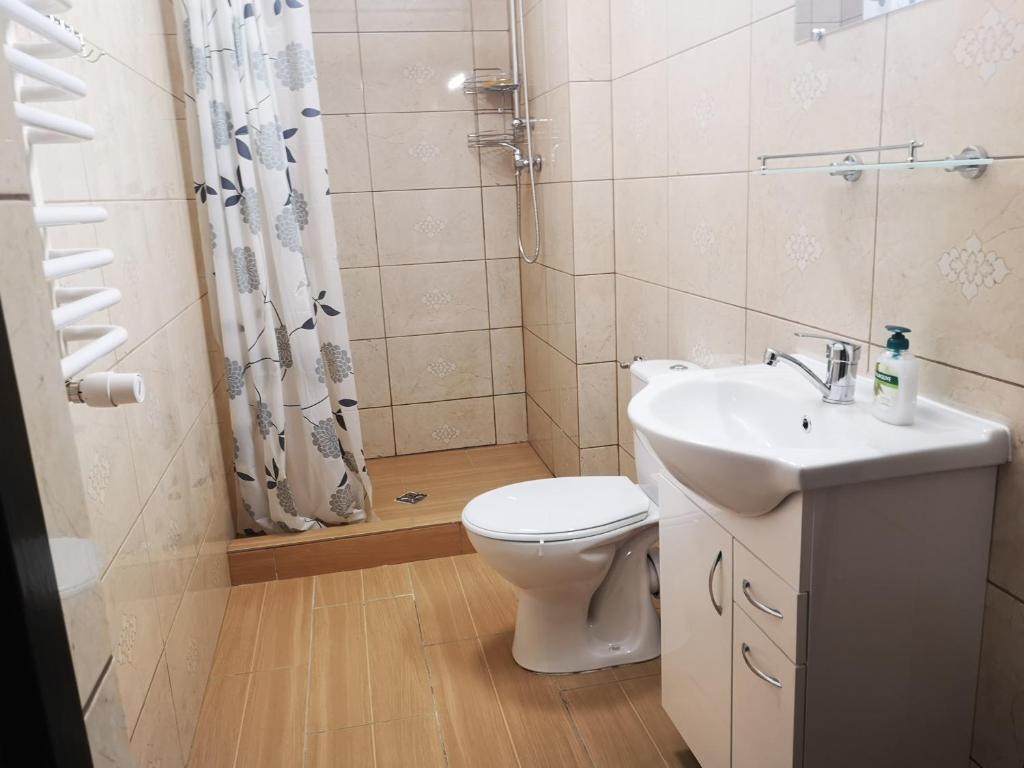 Kúpeľňa v ubytovaní Pokoje o wysokim standardzie