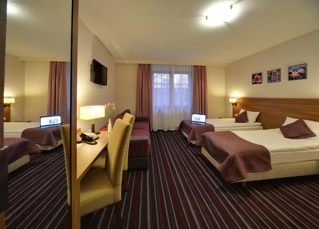 Hotel Camelot - Premium Vierpersoonskamer