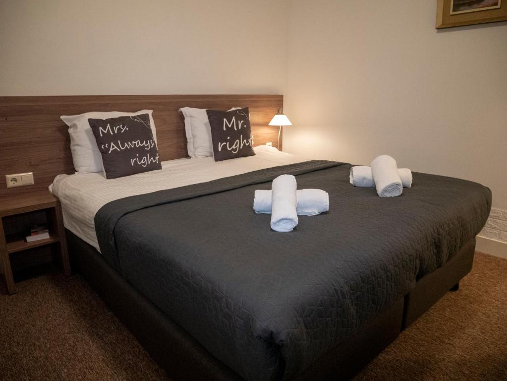 Postel nebo postele na pokoji v ubytování Hotel Hague Center