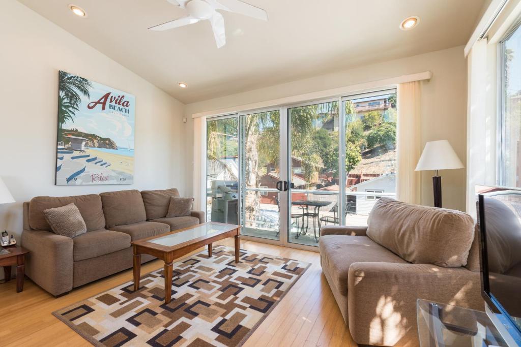 a living room with a couch and a table at 215 San Miguel in Avila Beach