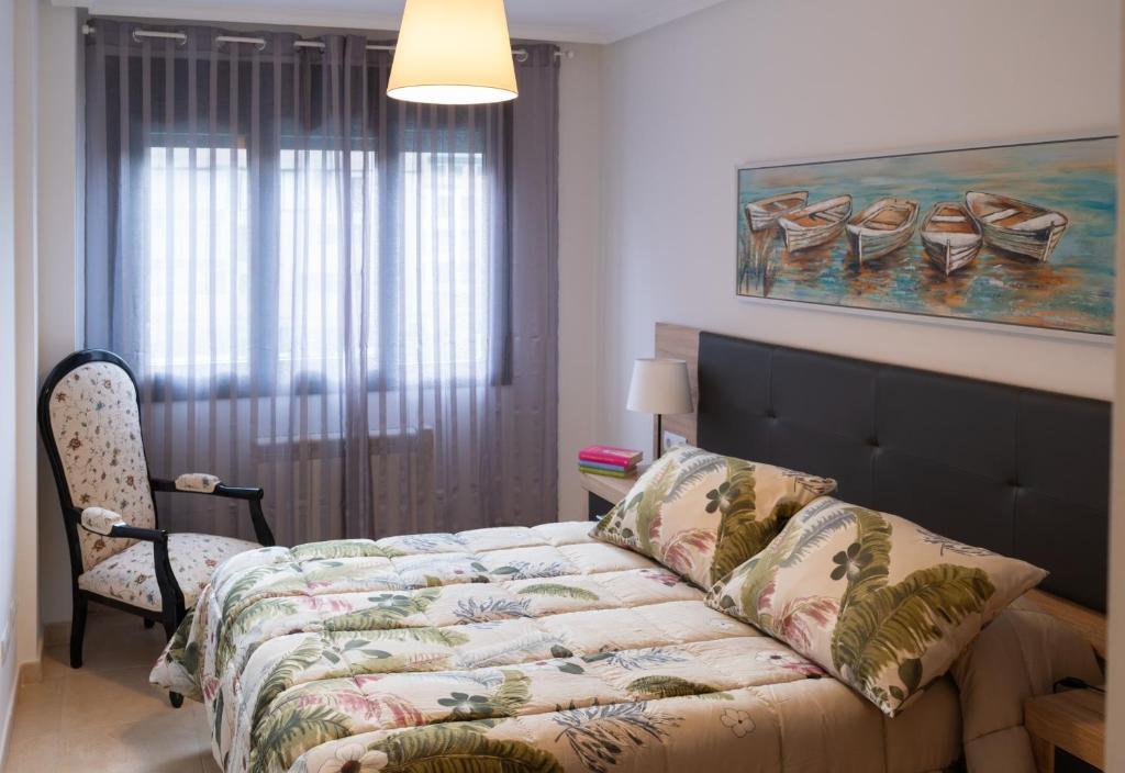 Postel nebo postele na pokoji v ubytování La Xalda, apartamento con piscina a 10 km de Llanes VUT-687-AS