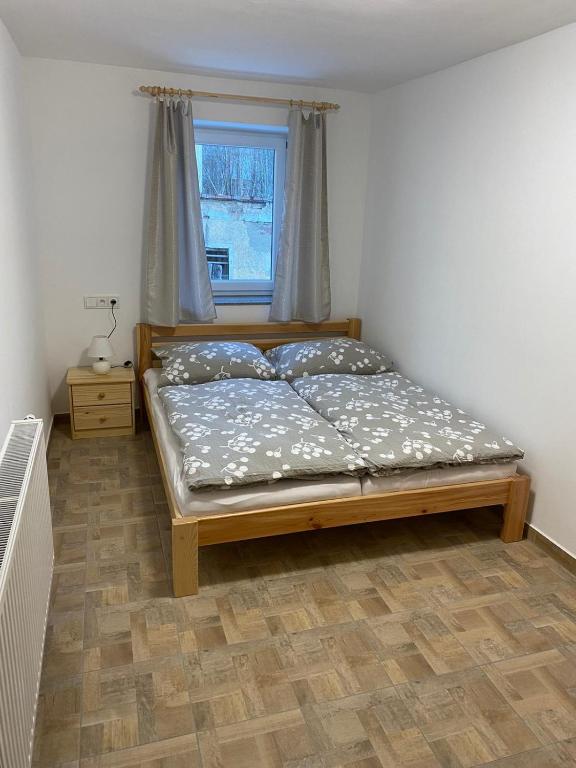 Postel nebo postele na pokoji v ubytování Apartmány Míra