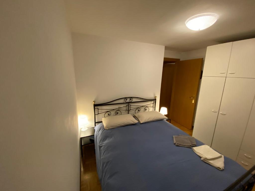 Postel nebo postele na pokoji v ubytování Appartamento di Viola & Elia