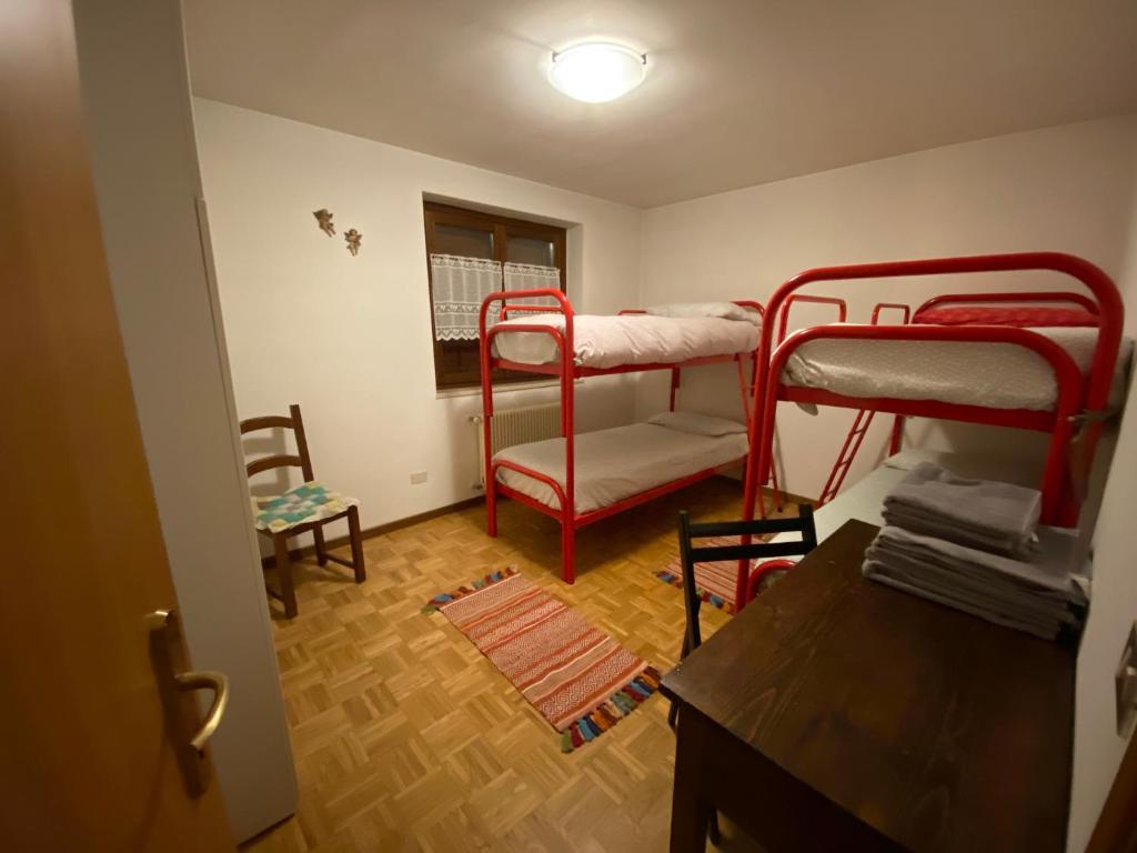 Postel nebo postele na pokoji v ubytování Appartamento di Viola & Elia