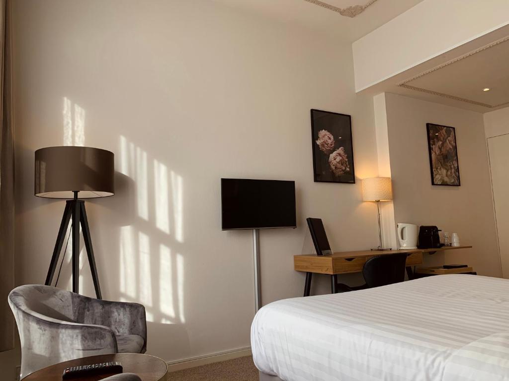 TV a/nebo společenská místnost v ubytování Hotel Grand Canal