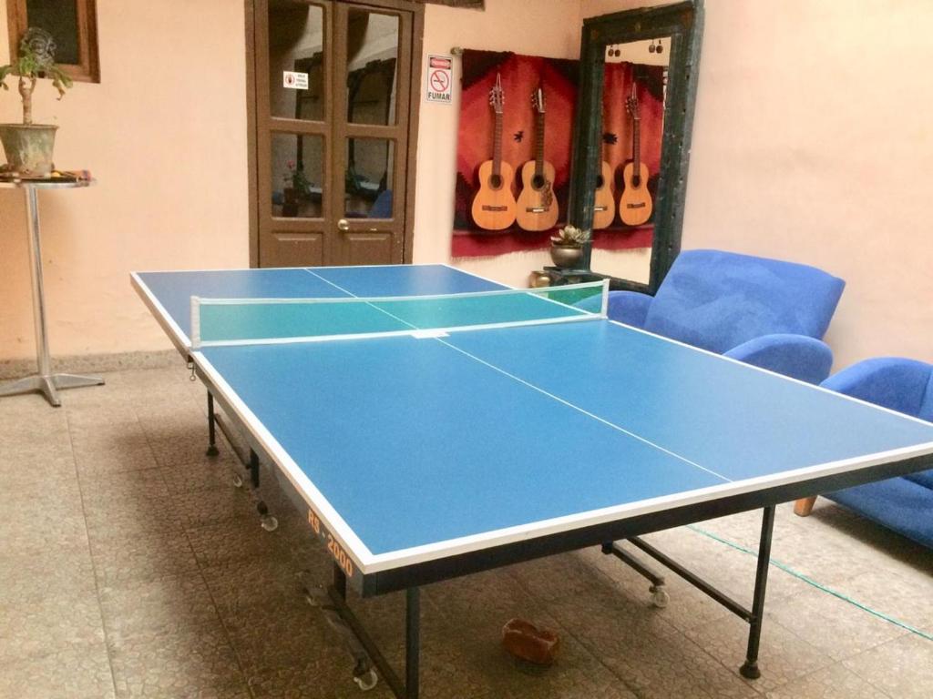 Stolní tenis v ubytování Huasi Lodge nebo okolí