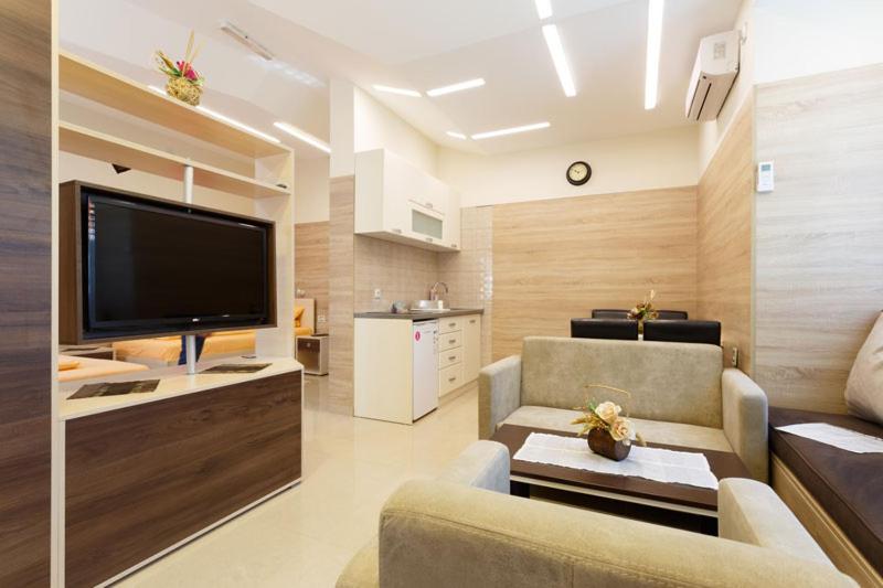 Μια τηλεόραση ή/και κέντρο ψυχαγωγίας στο Apartman UZOR