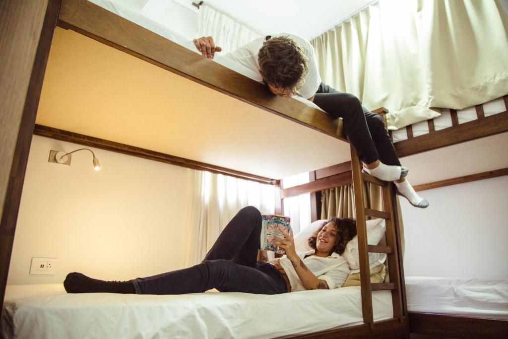 Postel nebo postele na pokoji v ubytování Hotel Florencia Plaza