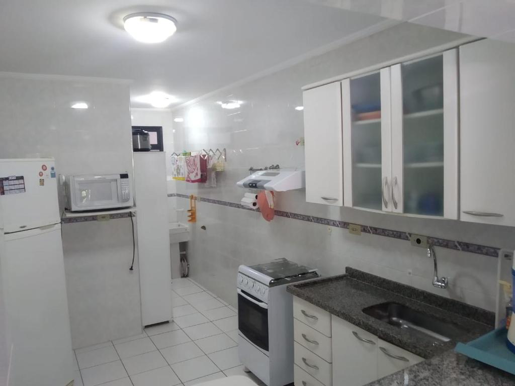  Apto Pe na areia em Bertioga apto 6 pessoas