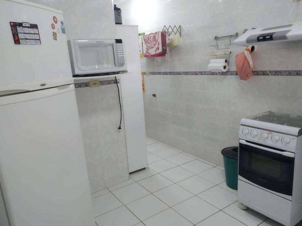  Apto Pe na areia em Bertioga apto 6 pessoas