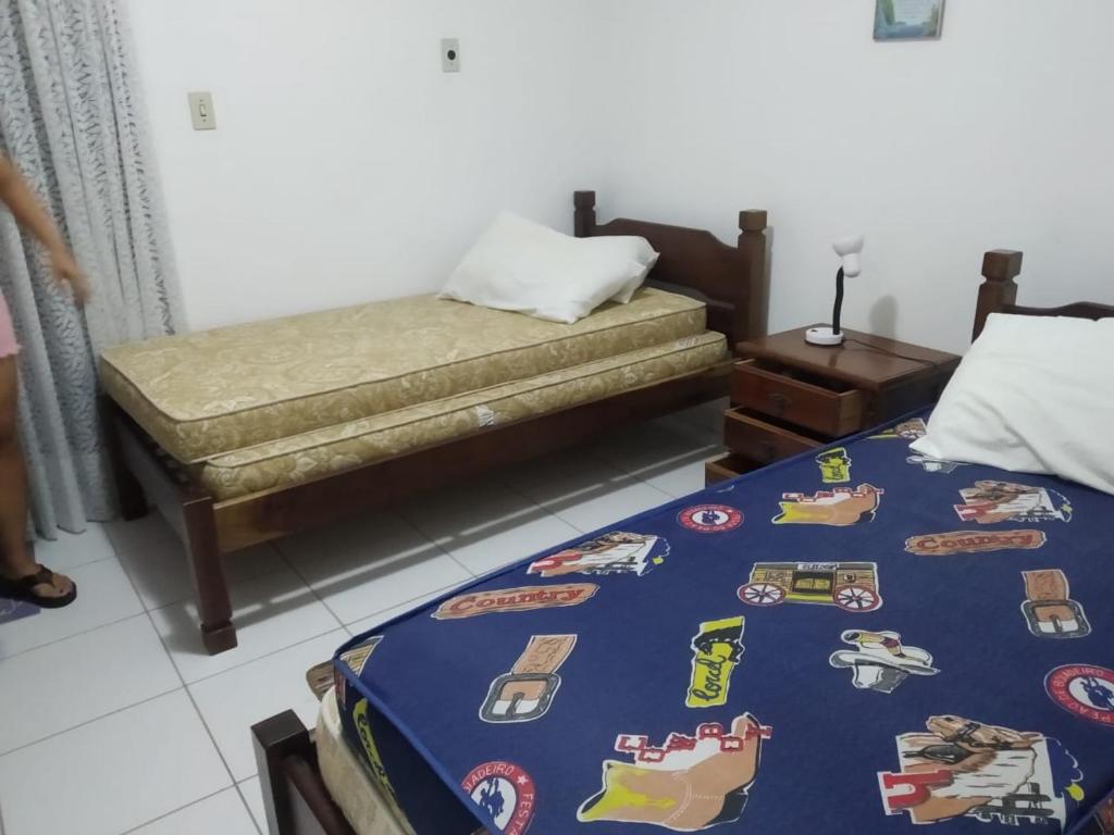 Apto Pe na areia em Bertioga apto 6 pessoas