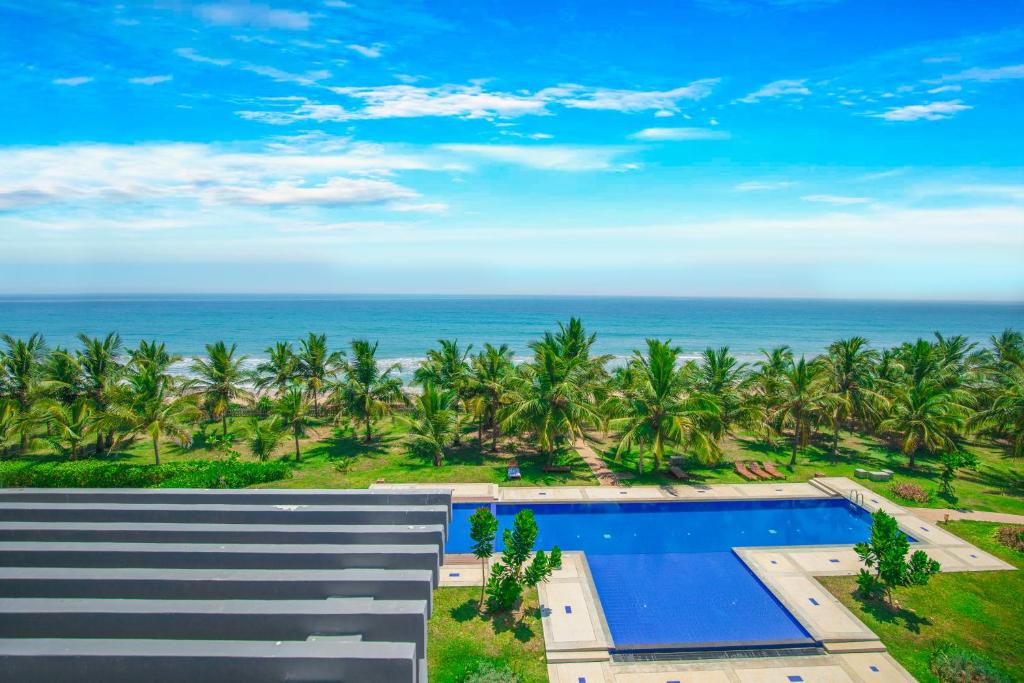 Bazén v ubytování Oceanfront Condominium - Nilaveli nebo v jeho okolí
