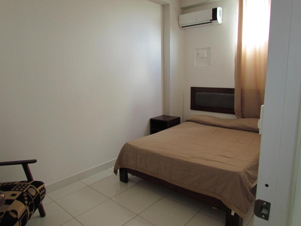 Postel nebo postele na pokoji v ubytování Plaza Coral Hotel