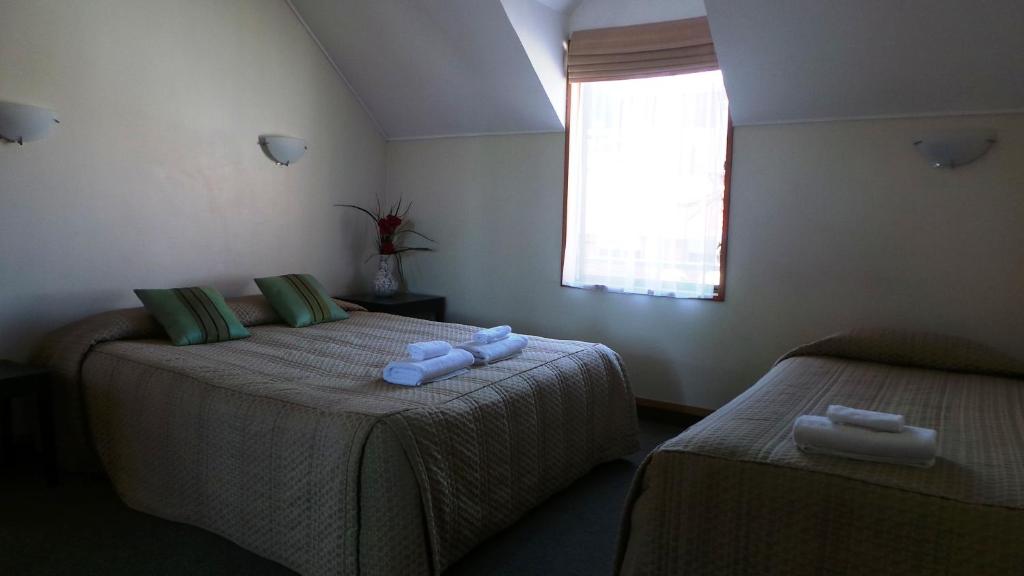 Postel nebo postele na pokoji v ubytování Owens Motel