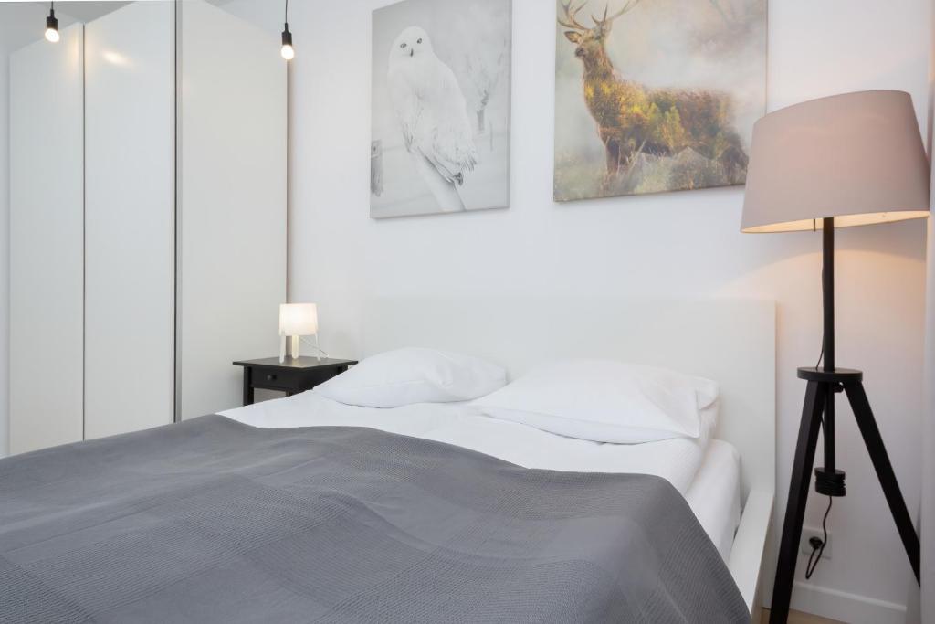 Posteľ alebo postele v izbe v ubytovaní Apartment Warsaw Żoliborz by Noclegi Renters