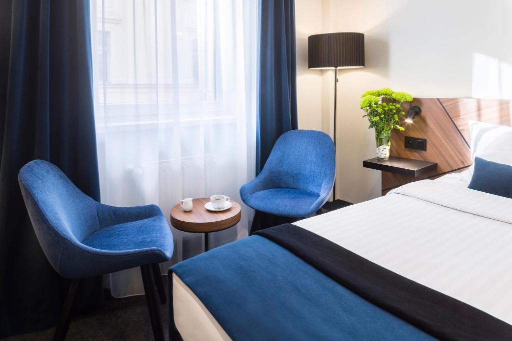 Posteľ alebo postele v izbe v ubytovaní Ascot Premium Hotel
