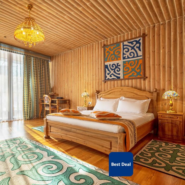 Postel nebo postele na pokoji v ubytování Navat Hotel