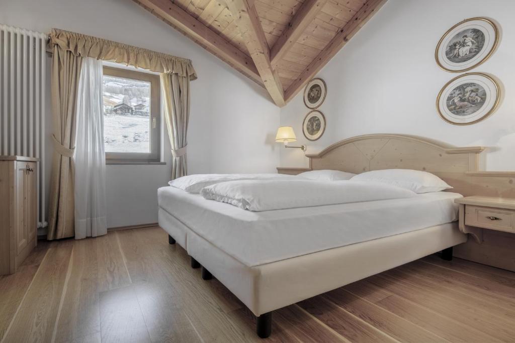 Posteľ alebo postele v izbe v ubytovaní Residence As'Odei