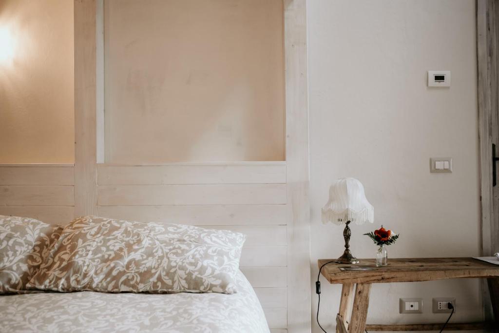 Łóżko lub łóżka w pokoju w obiekcie Guest House Al Devesio