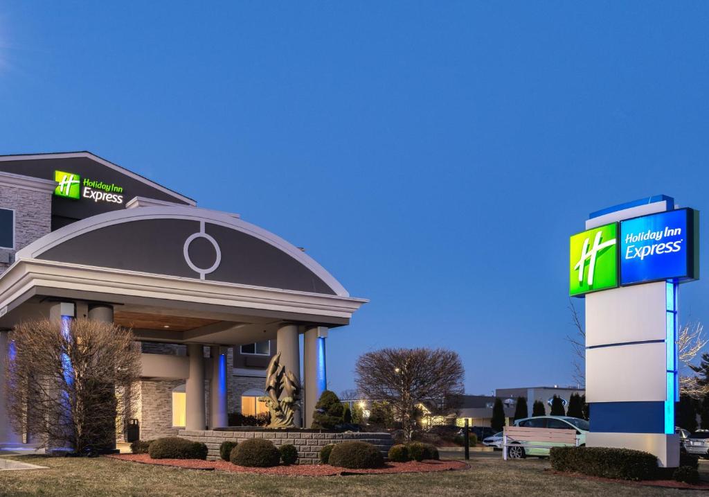 a gas station with a sign in front of it at Holiday Inn Express Branford-New Haven, an IHG Hotel in Branford