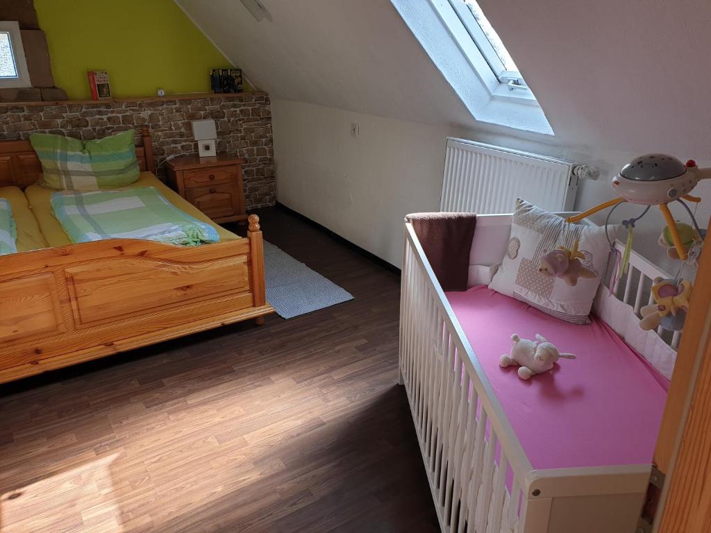 Voodi või voodid majutusasutuse Ferienhaus an See toas