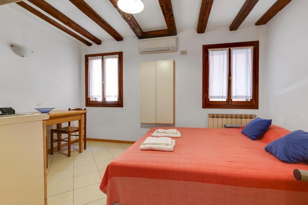Postel nebo postele na pokoji v ubytování B&B Giardini