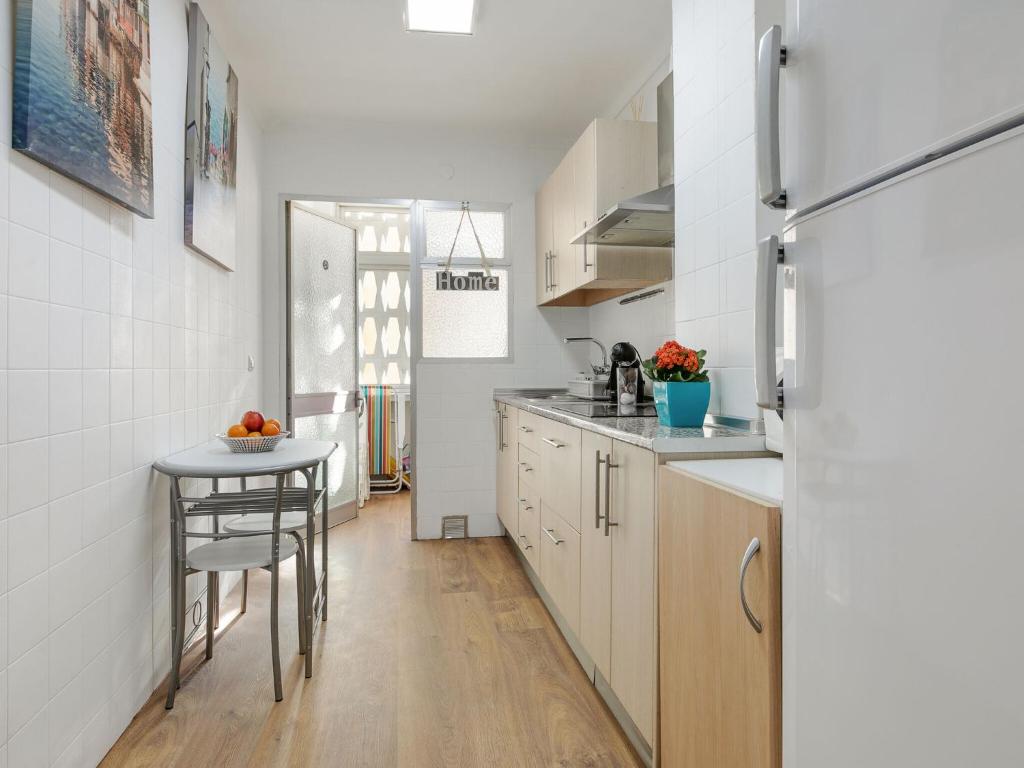 Kuchyň nebo kuchyňský kout v ubytování Belvilla by OYO Cozy apartment