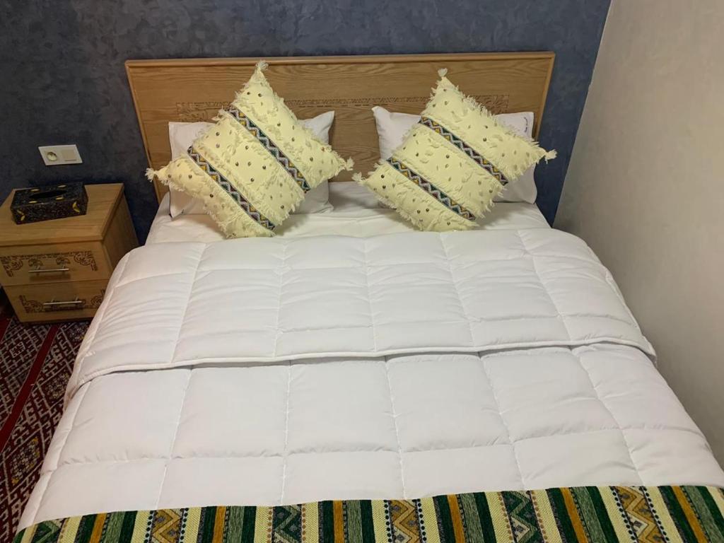 Postel nebo postele na pokoji v ubytování Riad Dar El Mesk