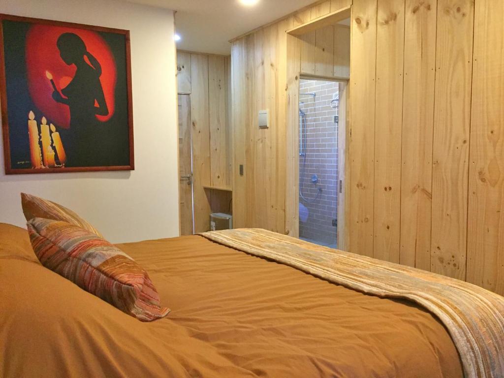 Postel nebo postele na pokoji v ubytování Lodge Colbún