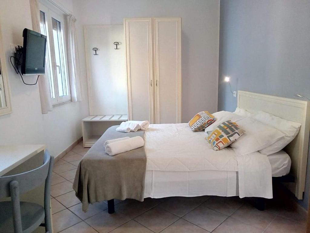 Postel nebo postele na pokoji v ubytování Hotel Garnì Anna