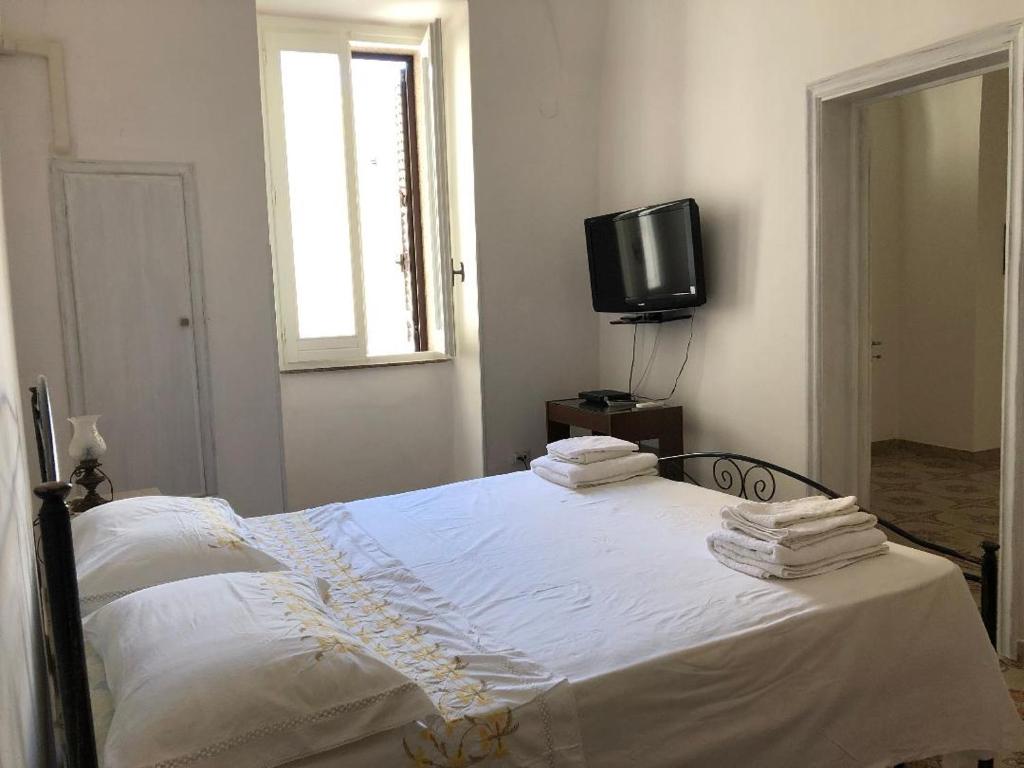 Łóżko lub łóżka w pokoju w obiekcie Gabriele-Apartment