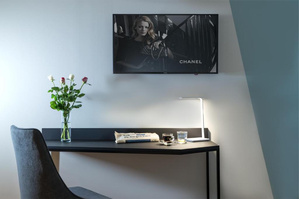 TV a/nebo společenská místnost v ubytování Athens One Smart Hotel