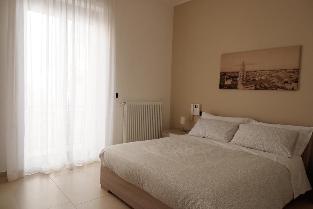Posteľ alebo postele v izbe v ubytovaní Il Campanile