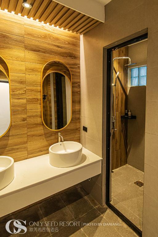 Koupelna v ubytování Only Seed Resort 欧芮希度假酒店
