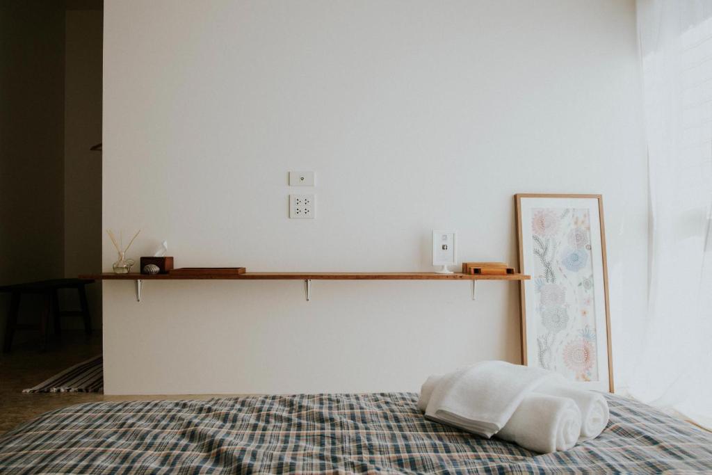 Postel nebo postele na pokoji v ubytování Baan Lek Villa