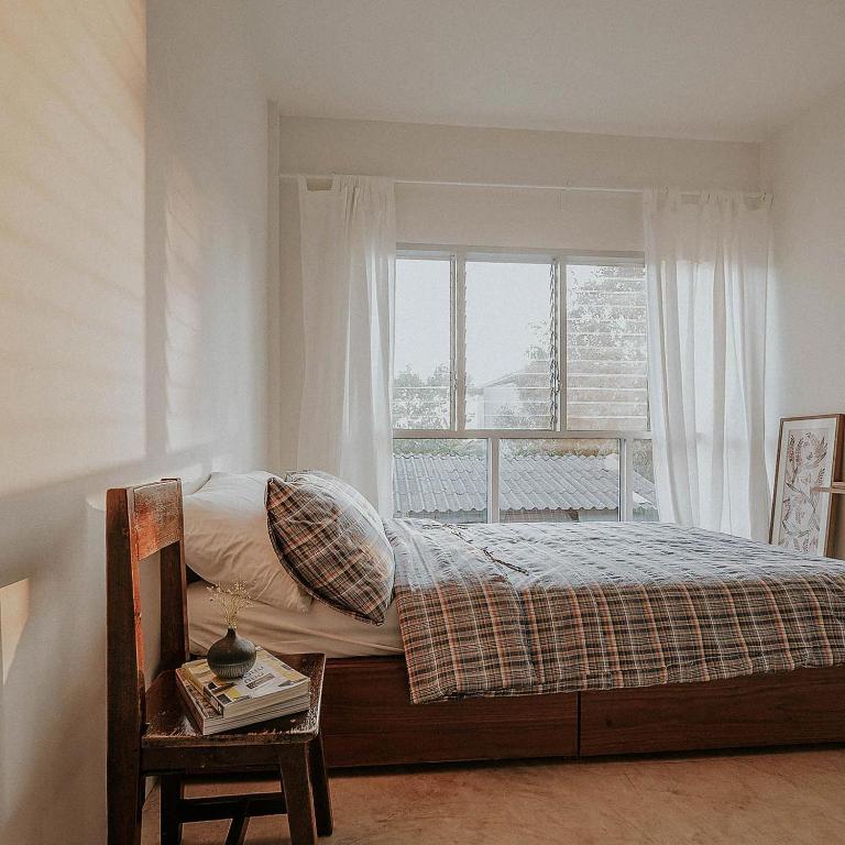 Postel nebo postele na pokoji v ubytování Baan Lek Villa