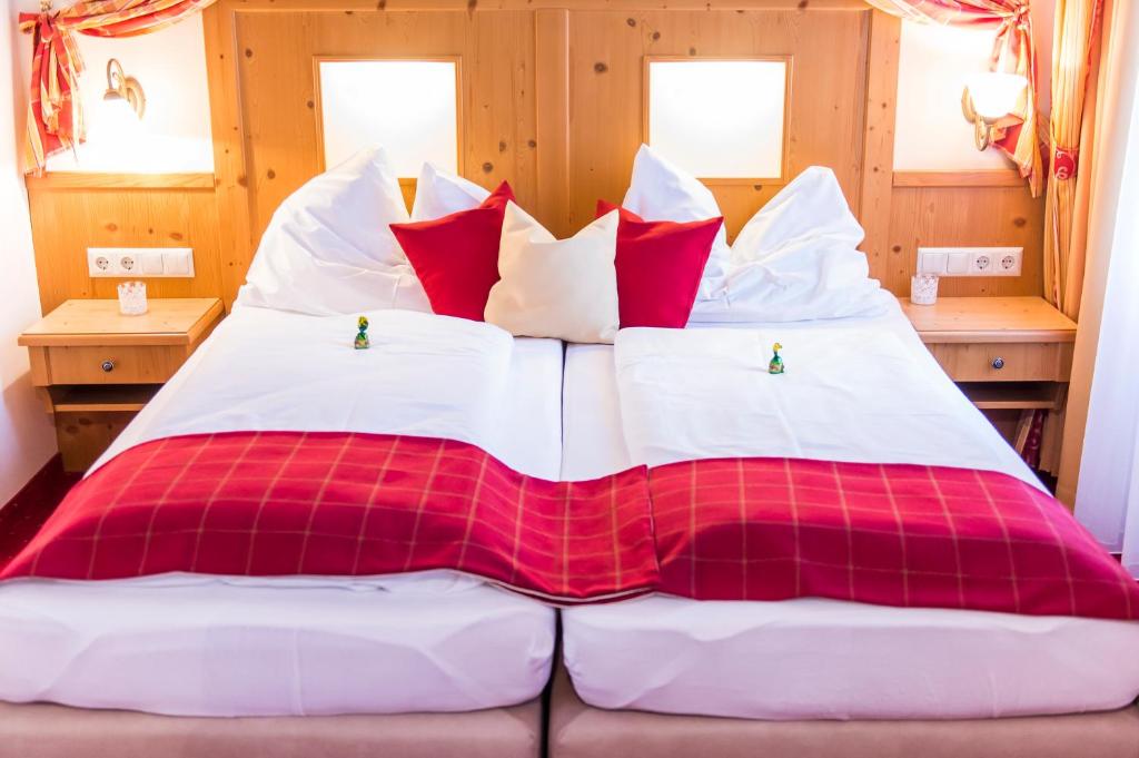 Postel nebo postele na pokoji v ubytování Landhotel Timmerer