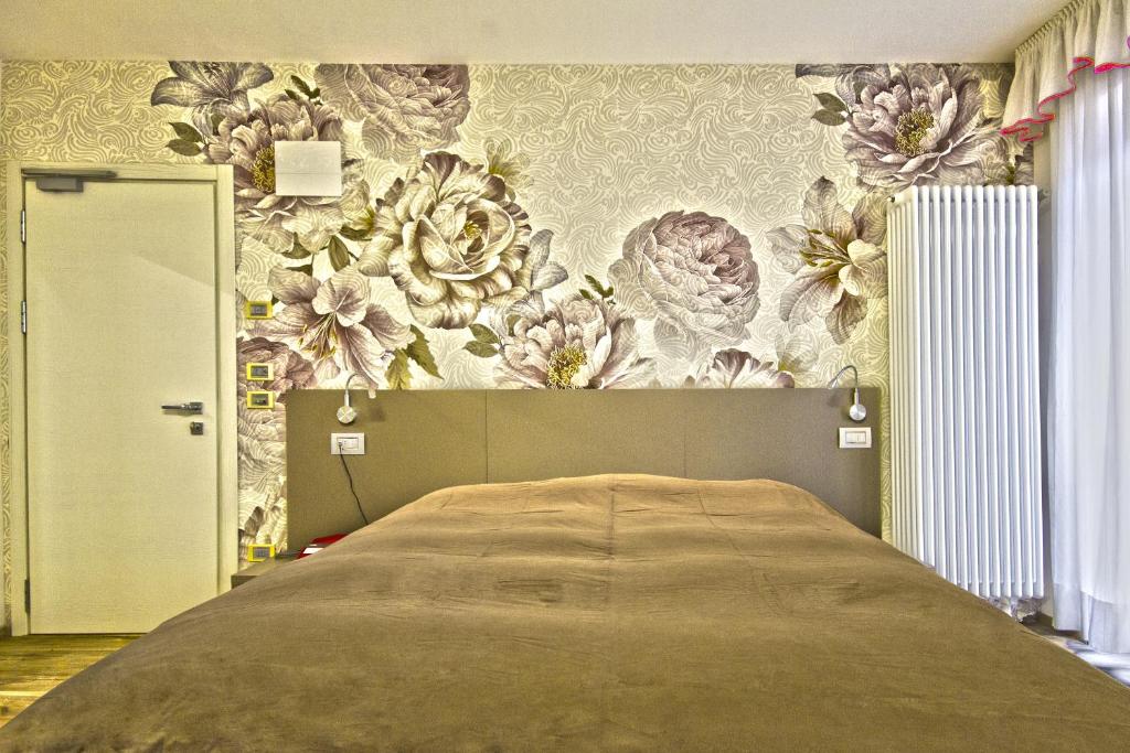 Postel nebo postele na pokoji v ubytování Hotel Venezia