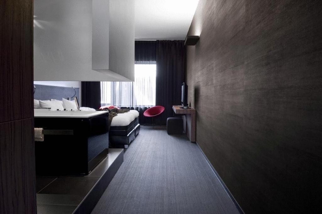 TV a/nebo společenská místnost v ubytování Carbon Hotel