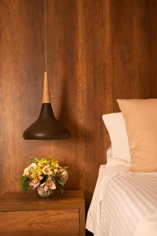 Postel nebo postele na pokoji v ubytování Hotel Santorini Loft