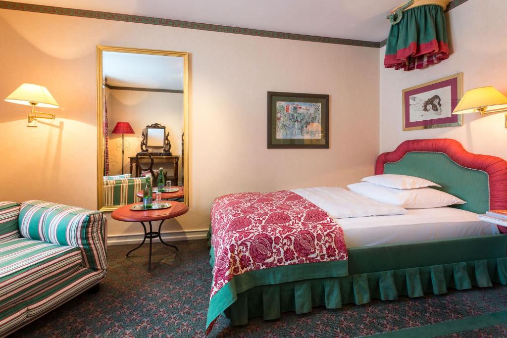 Postel nebo postele na pokoji v ubytování Hotel Edelweiss